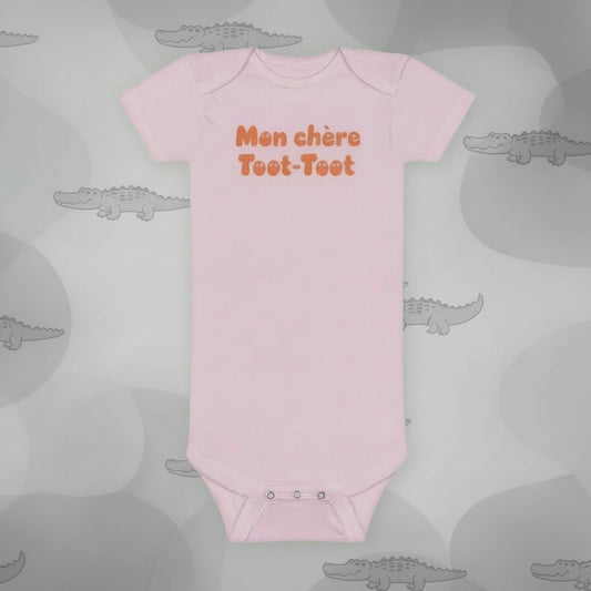 Mon cheer Toot-Toot ( my everything) Wabi Sabi Baby Onesie precious for your favorite little cajan baby.